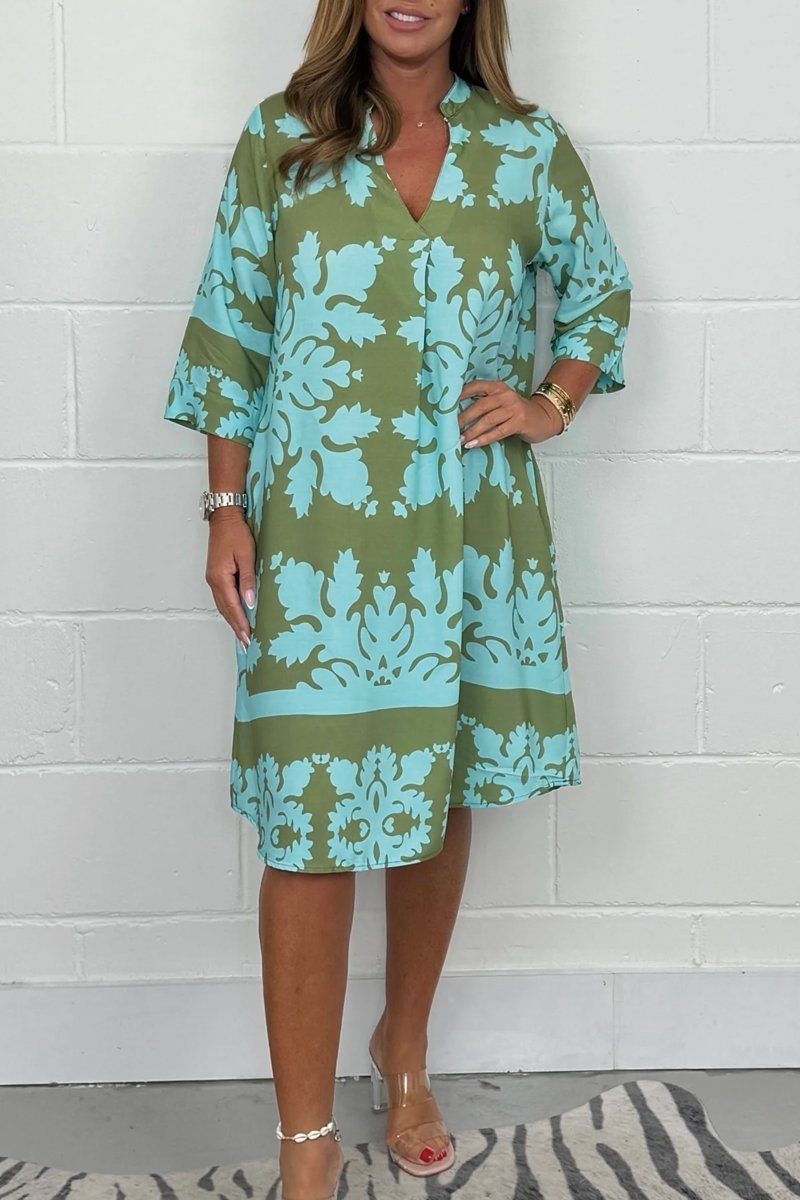 Robe Rayonnante En Col V